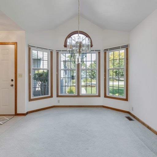 2600 Miller Road Geneva, IL 60134 - Photo 8 of 27 a view of an empty room with a window