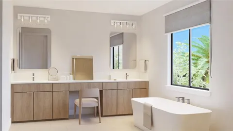 a bathroom with a double vanity sink a mirror and a bathtub