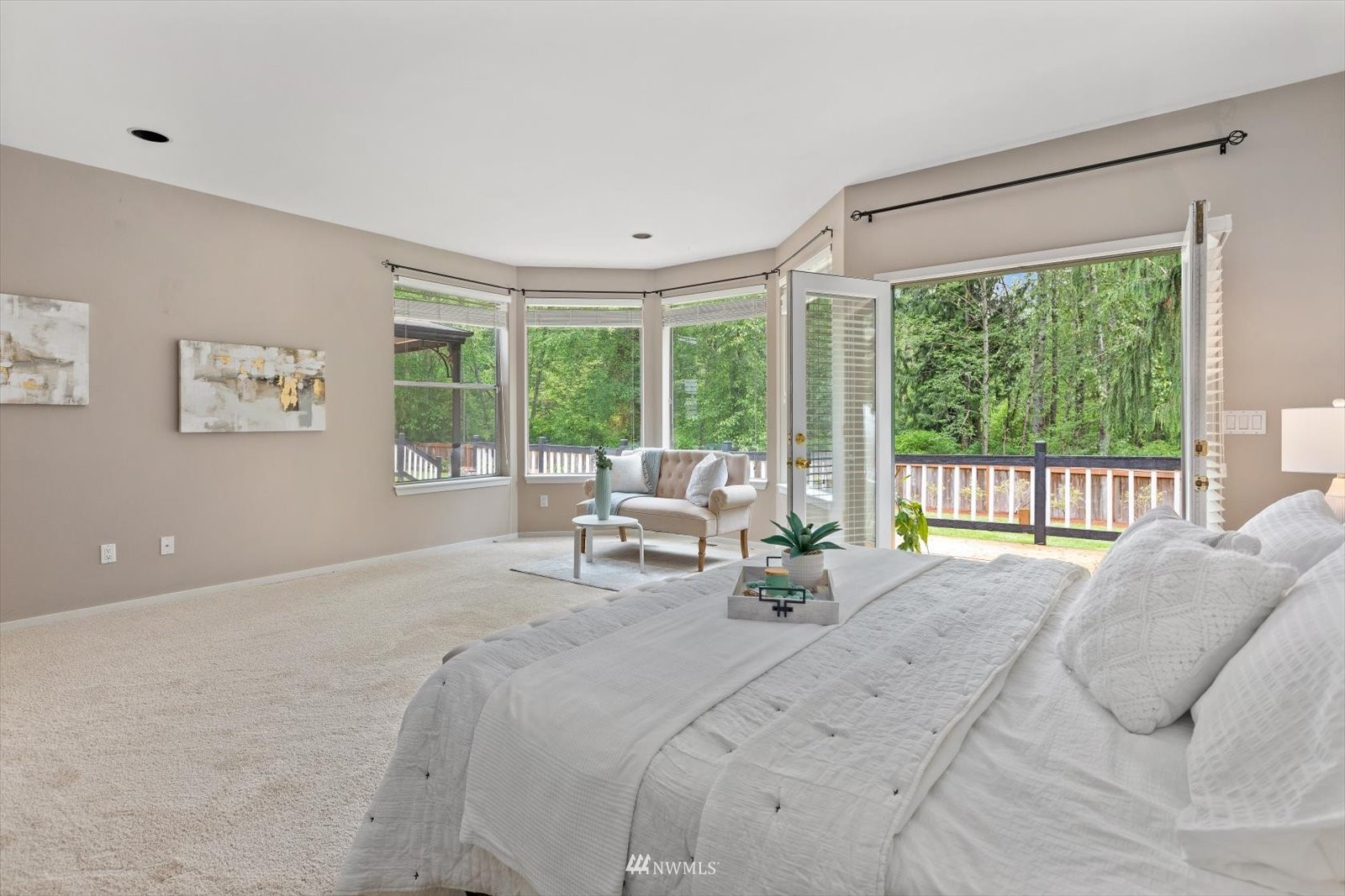 13629 3rd Drive Southeast Everett, WA 98208 - Photo 11 of 40 a spacious bedroom with a large bed and a large window