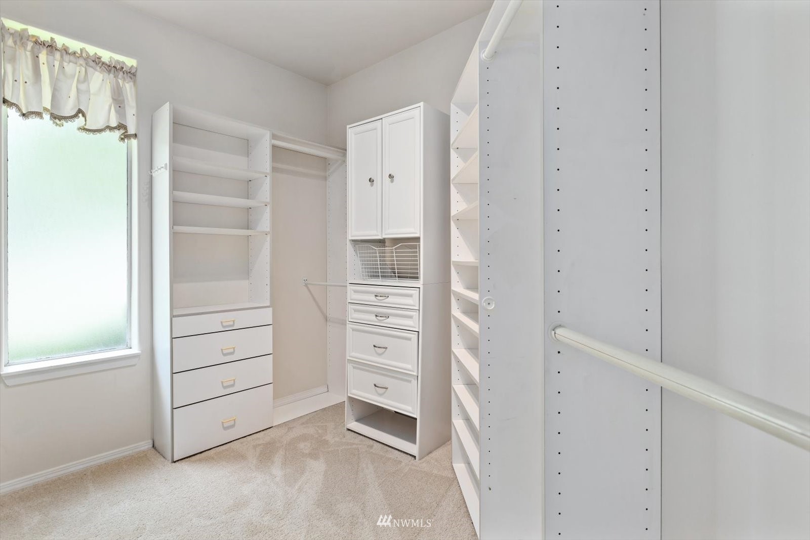 13629 3rd Drive Southeast Everett, WA 98208 - Photo 12 of 40 a view of walk in closet with empty racks