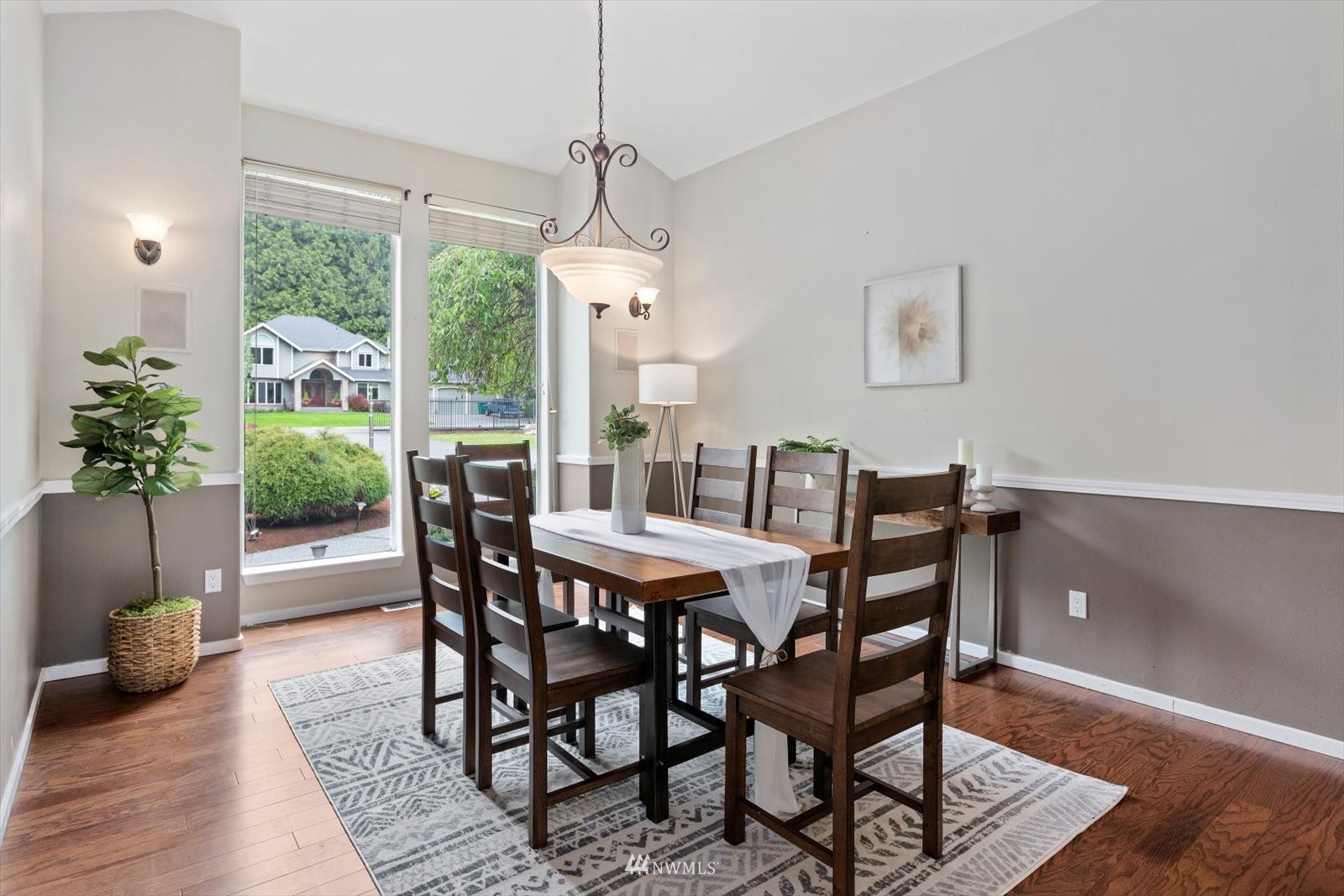 13629 3rd Drive Southeast Everett, WA 98208 - Photo 16 of 40 a view of a dining room with furniture window and wooden floor