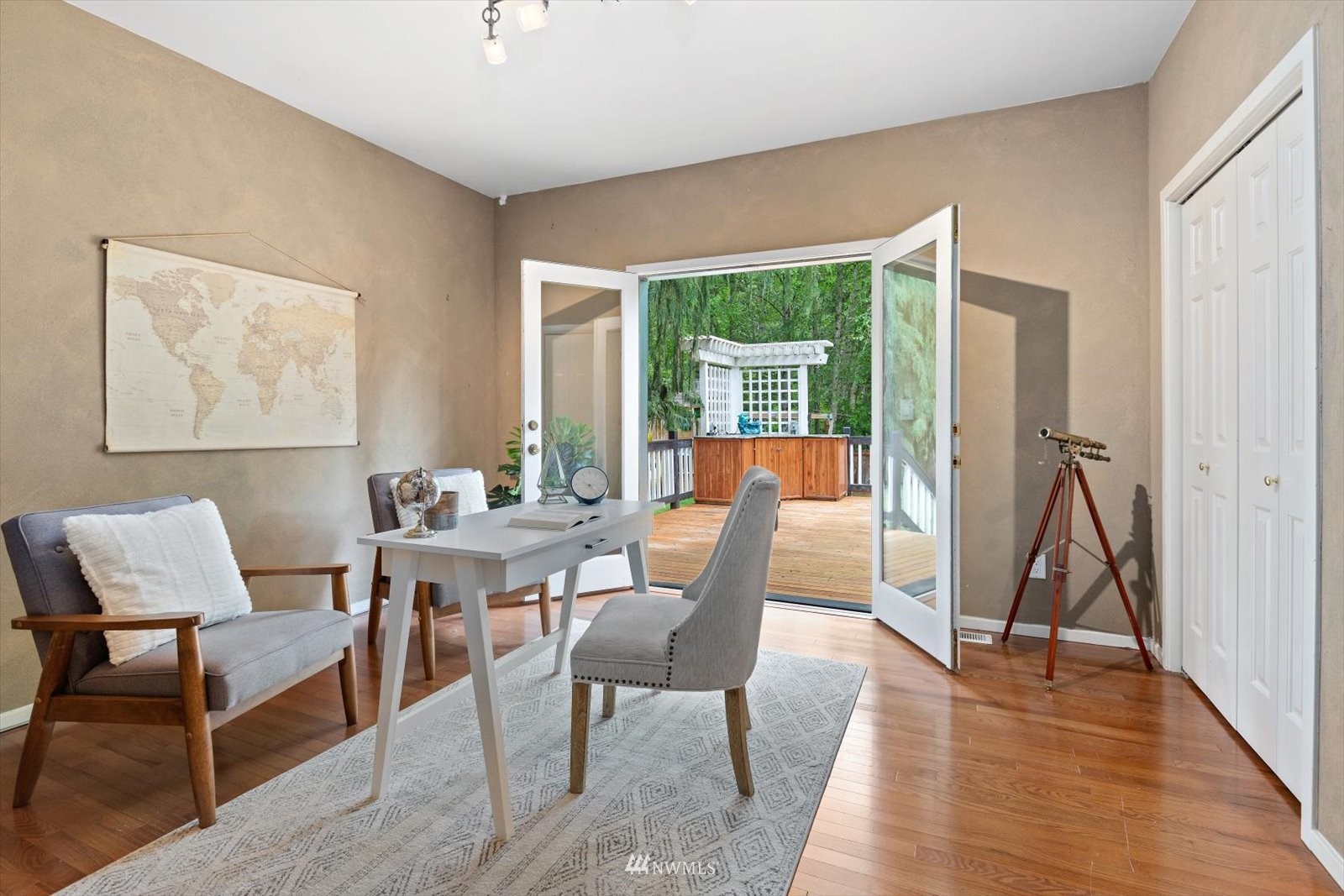 13629 3rd Drive Southeast Everett, WA 98208 - Photo 21 of 40 a dining room with furniture a rug and wooden floor