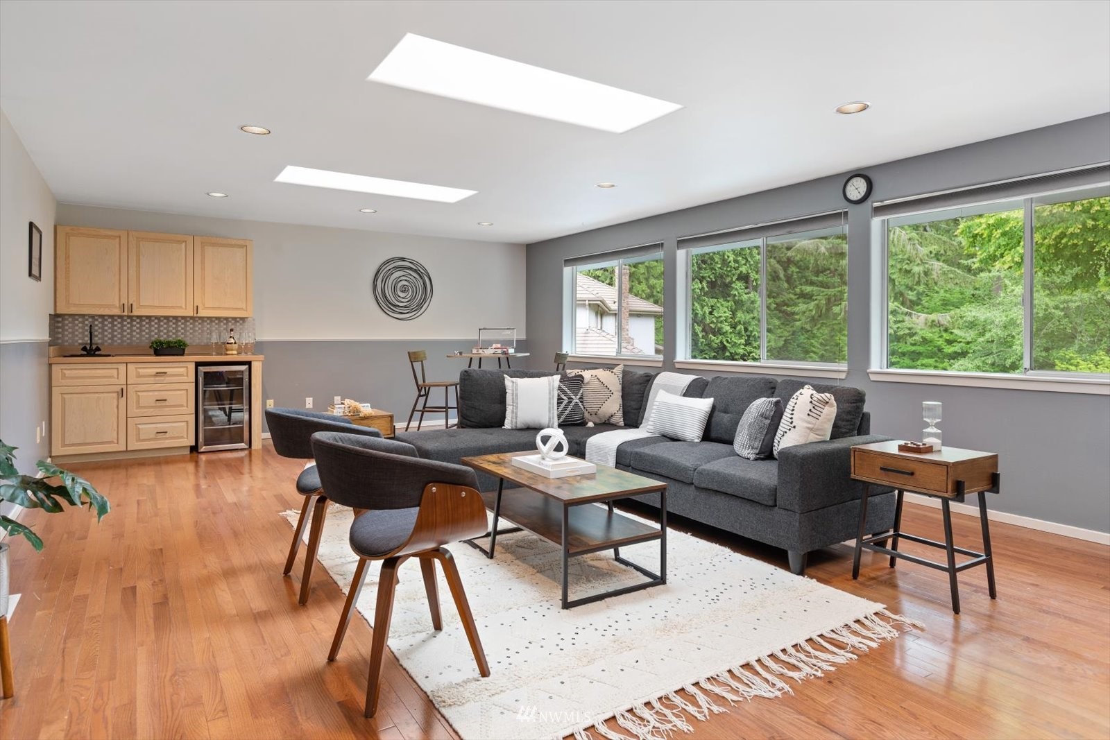 13629 3rd Drive Southeast Everett, WA 98208 - Photo 24 of 40 a living room with stainless steel appliances granite countertop furniture a fireplace and a large window