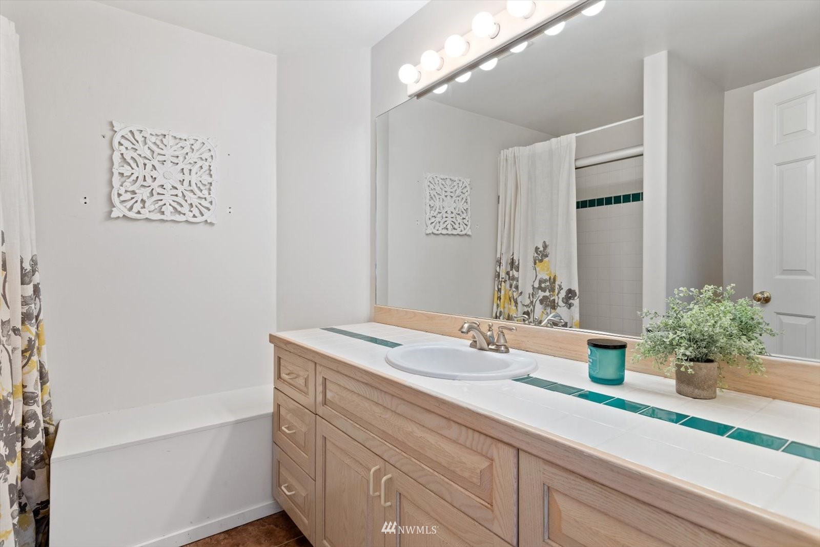 13629 3rd Drive Southeast Everett, WA 98208 - Photo 26 of 40 a bathroom with a sink and a mirror