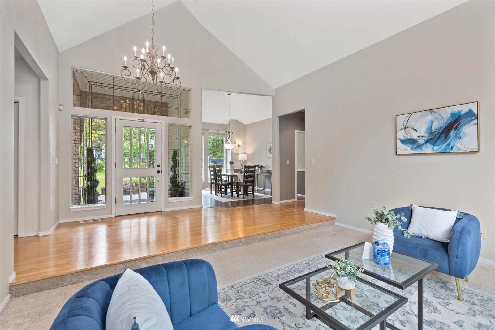 13629 3rd Drive Southeast Everett, WA 98208 - Photo 8 of 40 a living room with furniture and a chandelier