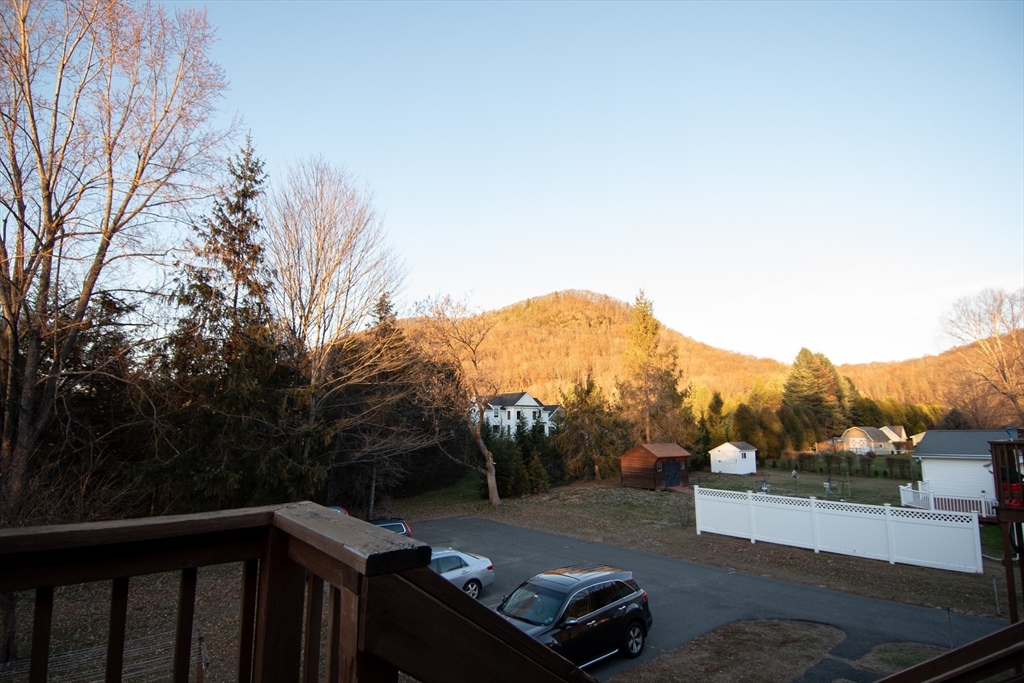 29 Mountain Road, Unit 2L Deerfield, MA 01373 - Photo 6 of 6 a view of a terrace with a yard