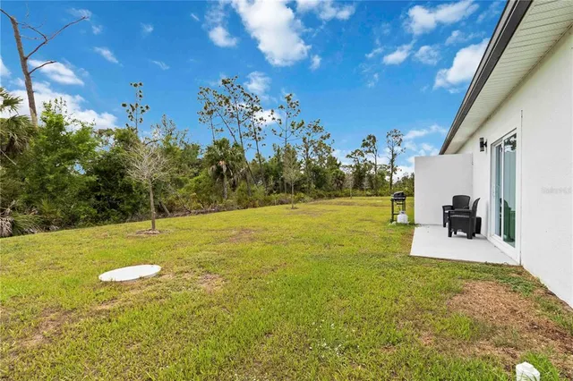 a view of a playground with basketball court