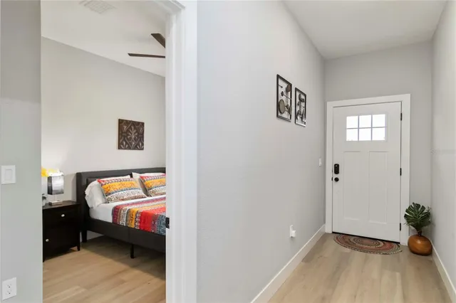 a bedroom with bed and window
