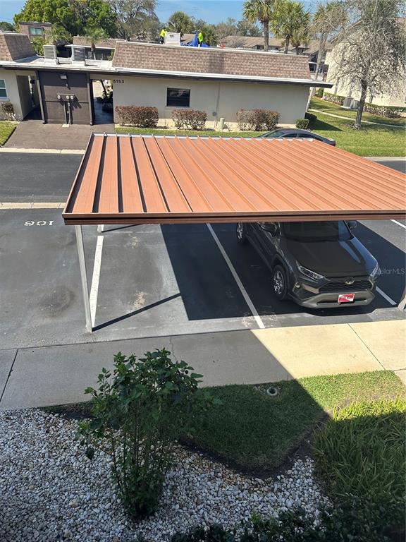 5154 Turquoise Lane, Unit 206 New Port Richey, FL 34652 - Photo 20 of 54 a view of outdoor space and yard