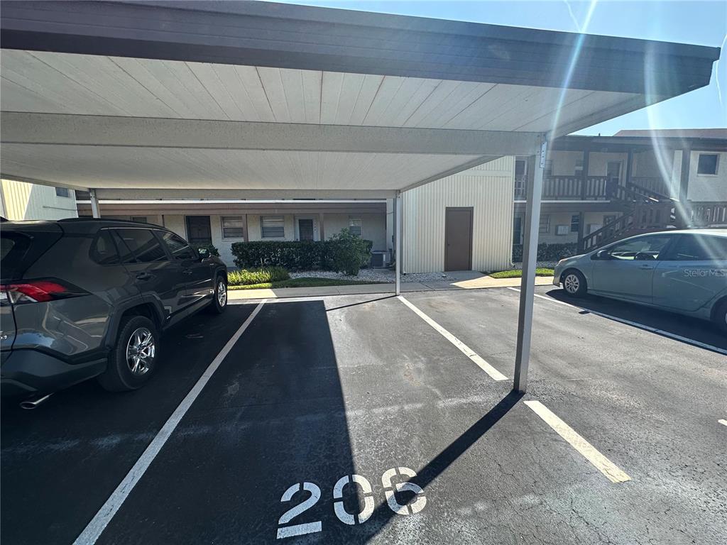 5154 Turquoise Lane, Unit 206 New Port Richey, FL 34652 - Photo 23 of 54 a view of parking garage