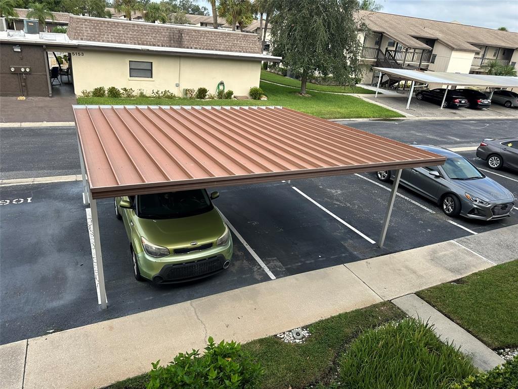 5154 Turquoise Lane, Unit 206 New Port Richey, FL 34652 - Photo 52 of 54 a view of a backyard with sitting area