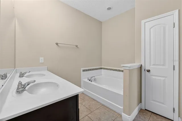 a bathroom with a sink and a bathtub