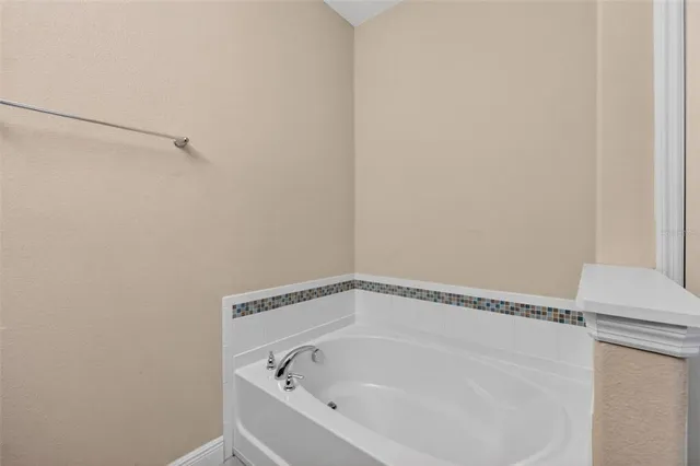 a close view of a bathtub in bathroom