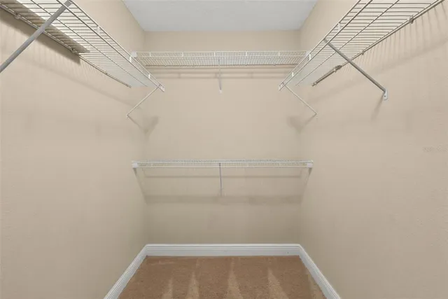 a view of a room with racks on the wall