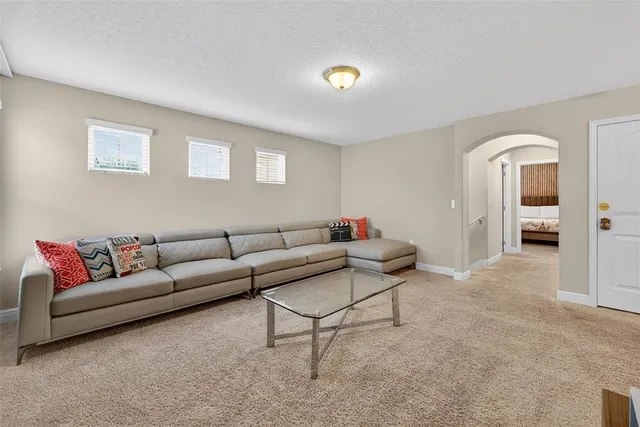 a living room with furniture and a couch