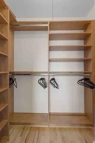 a view of a room with racks on the wall