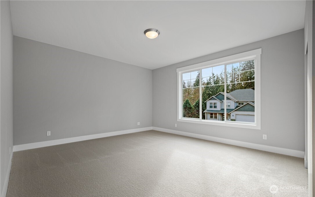 8831 27th Street East Edgewood, WA 98371 - Photo 15 of 27 an empty room with window