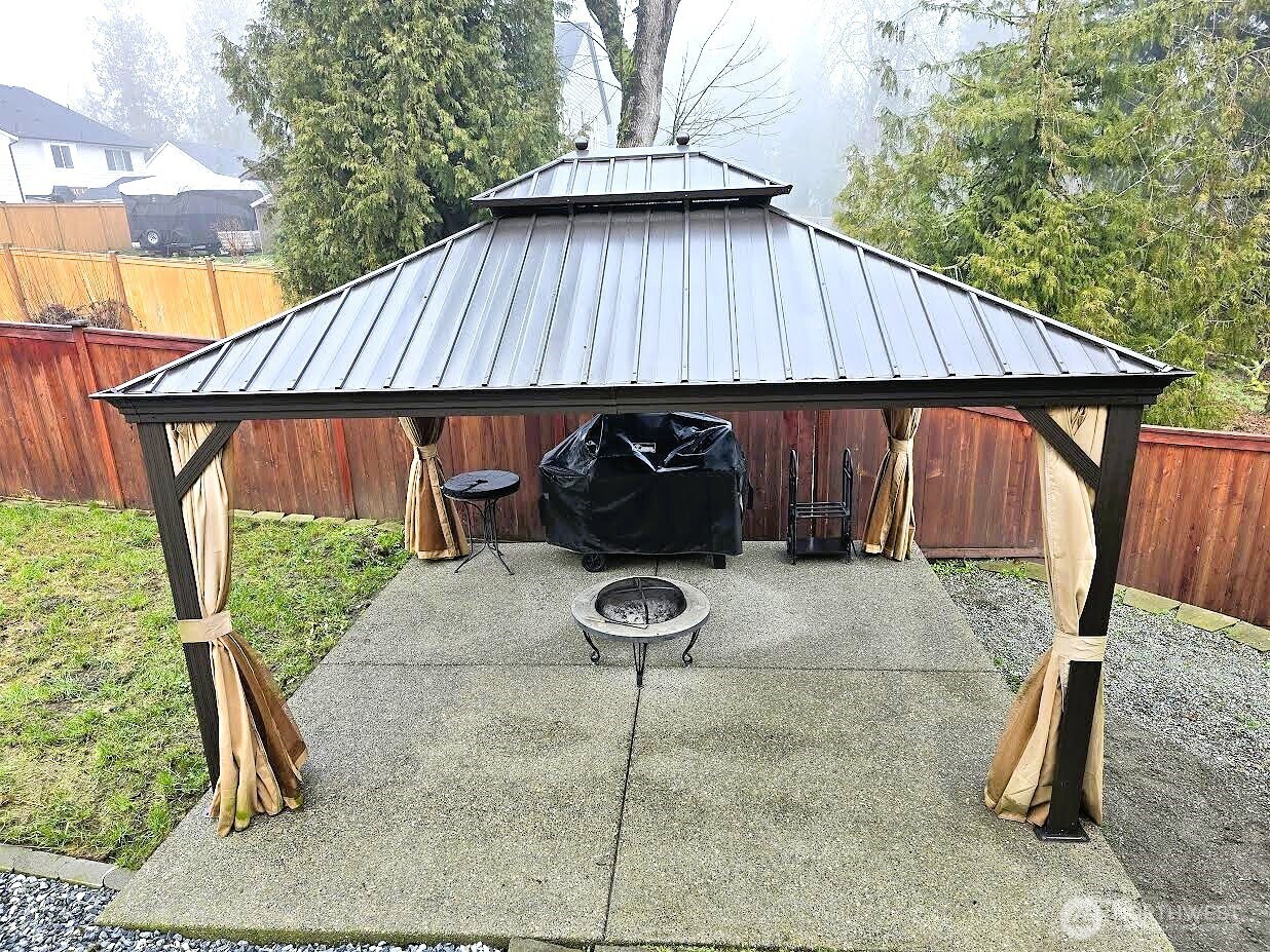 8831 27th Street East Edgewood, WA 98371 - Photo 24 of 27 a backyard of a house with seating space