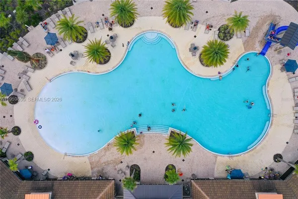 an aerial view of a swimming pool