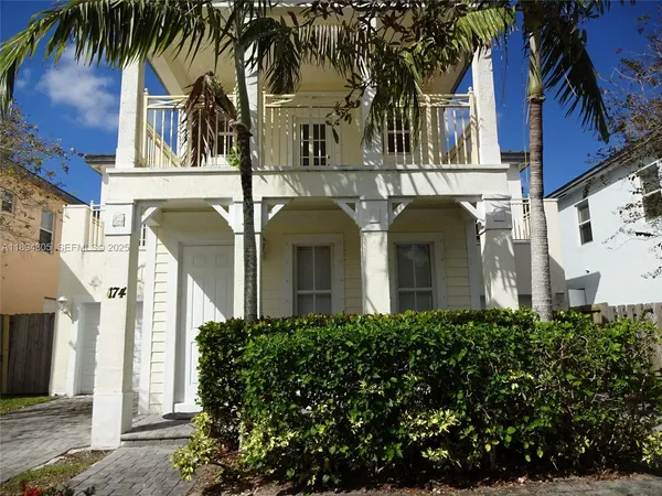 front view of house with a small yard