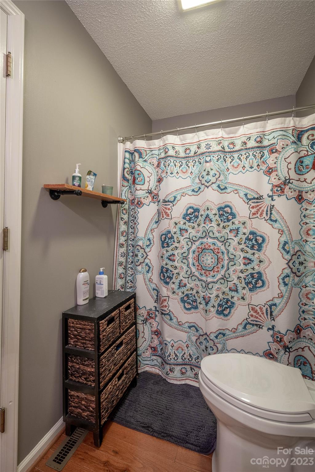 4331 Acorn Trace Morganton, NC 28655 - Photo 14 of 22 a bathroom with a sink toilet and shower curtain