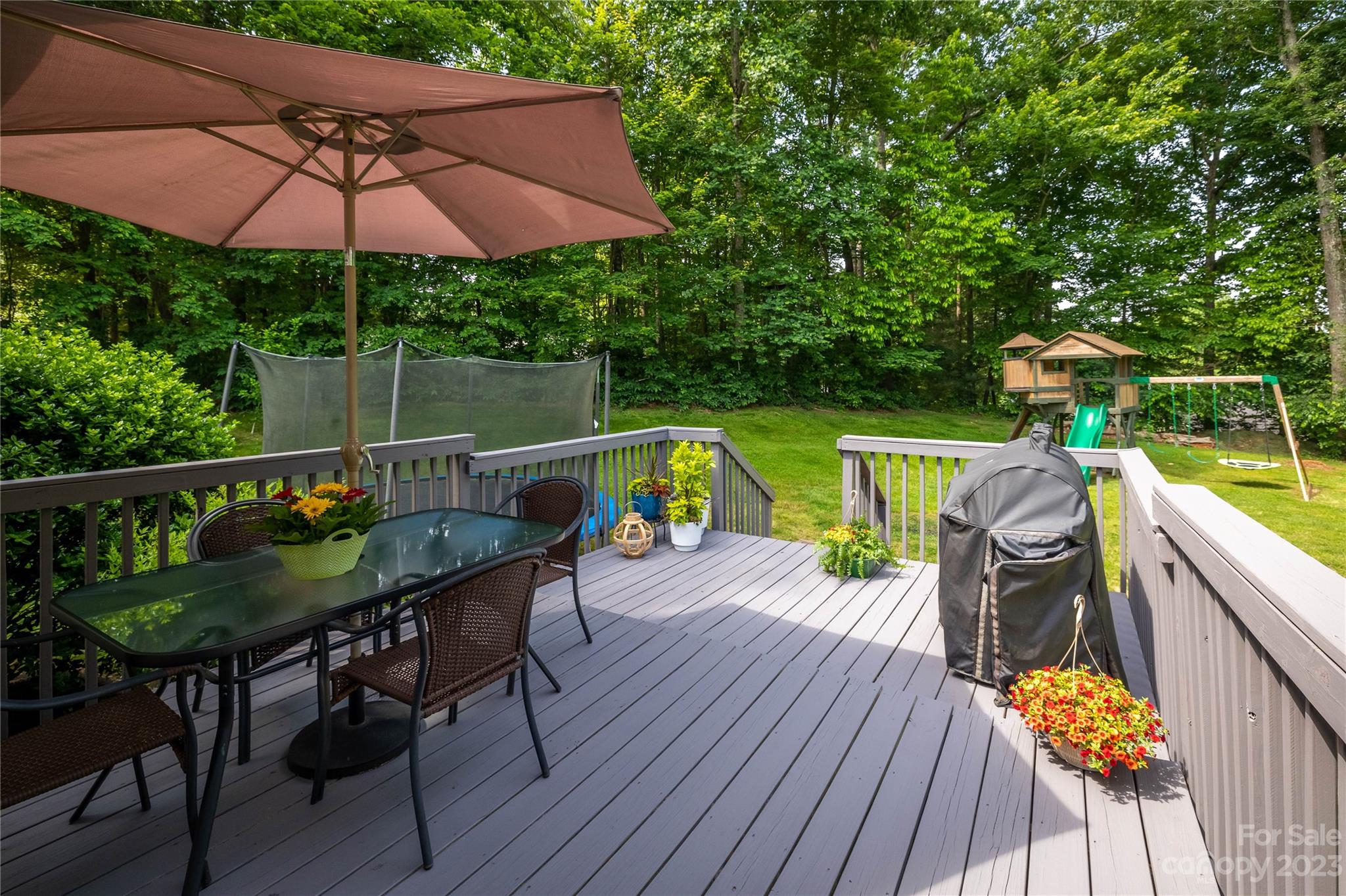 4331 Acorn Trace Morganton, NC 28655 - Photo 20 of 22 a view of a chair and tables on the deck