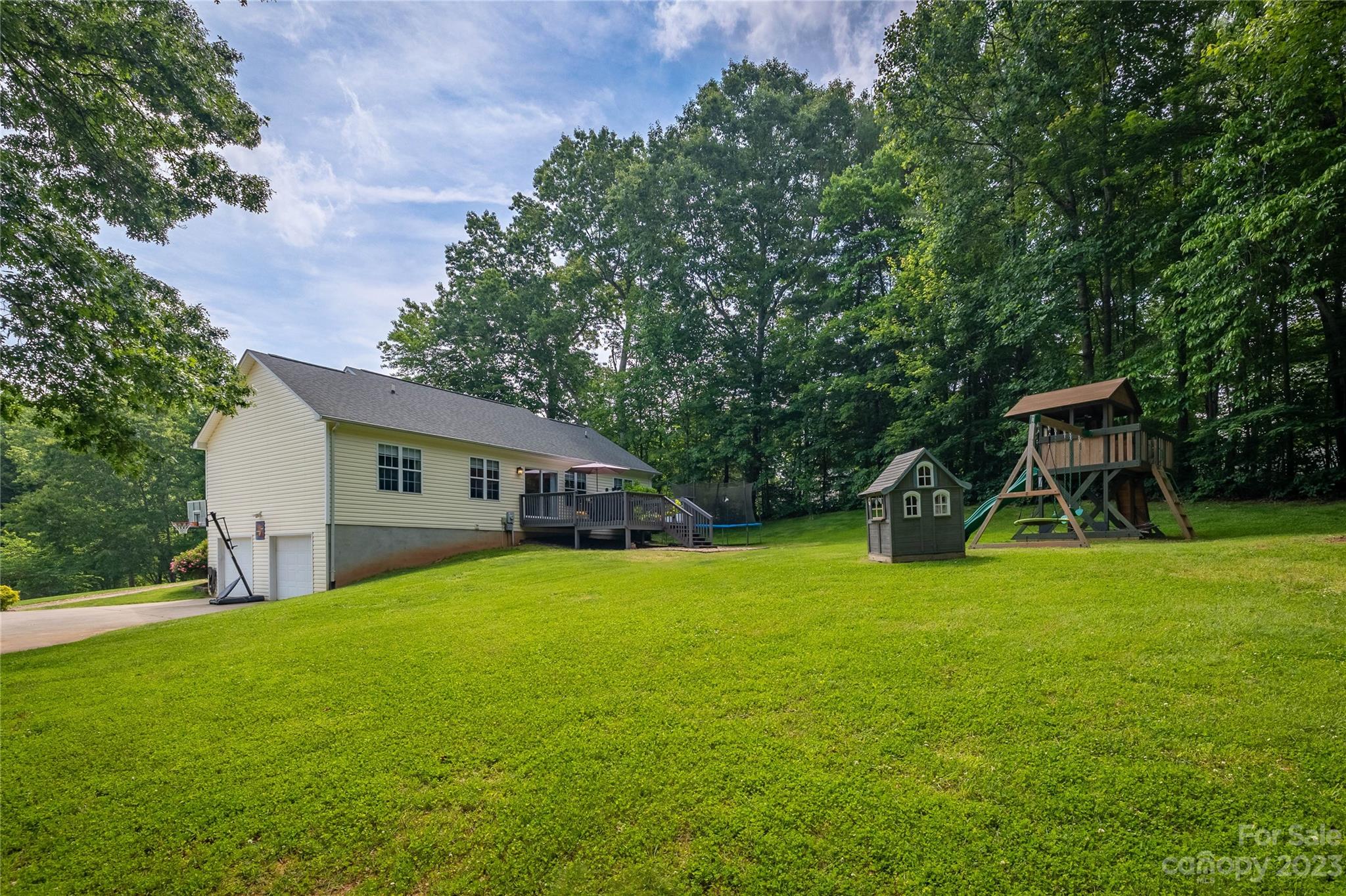 4331 Acorn Trace Morganton, NC 28655 - Photo 21 of 22 a view of a house with a yard