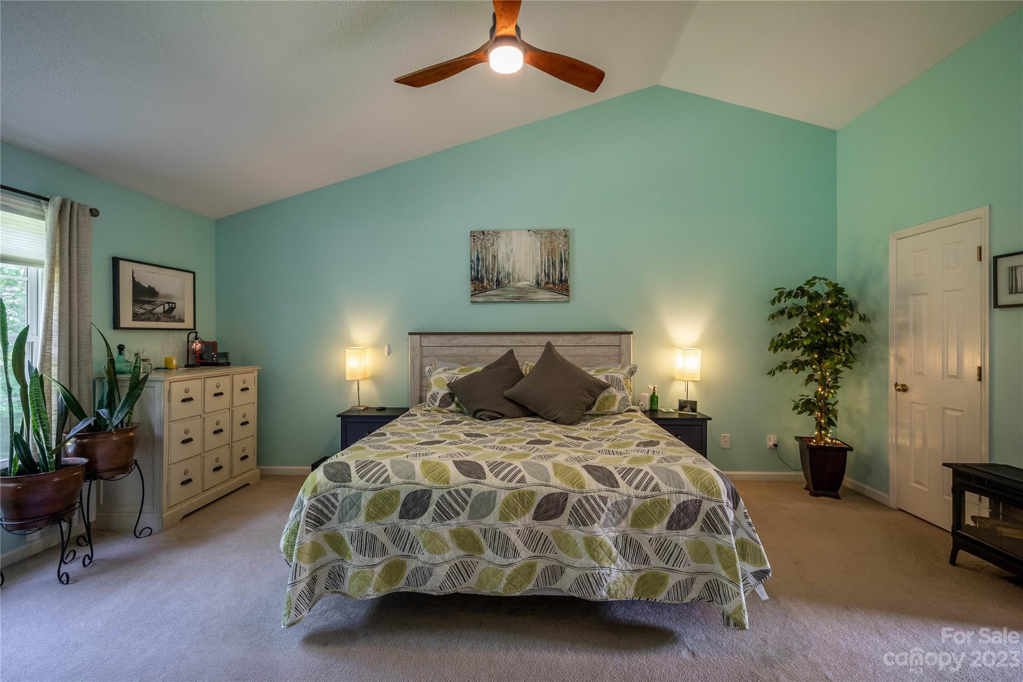 4331 Acorn Trace Morganton, NC 28655 - Photo 8 of 22 a bedroom with a bed and potted plant