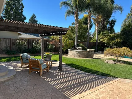 a garden view with a seating space