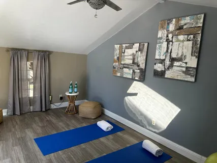 a living room with furniture and a window