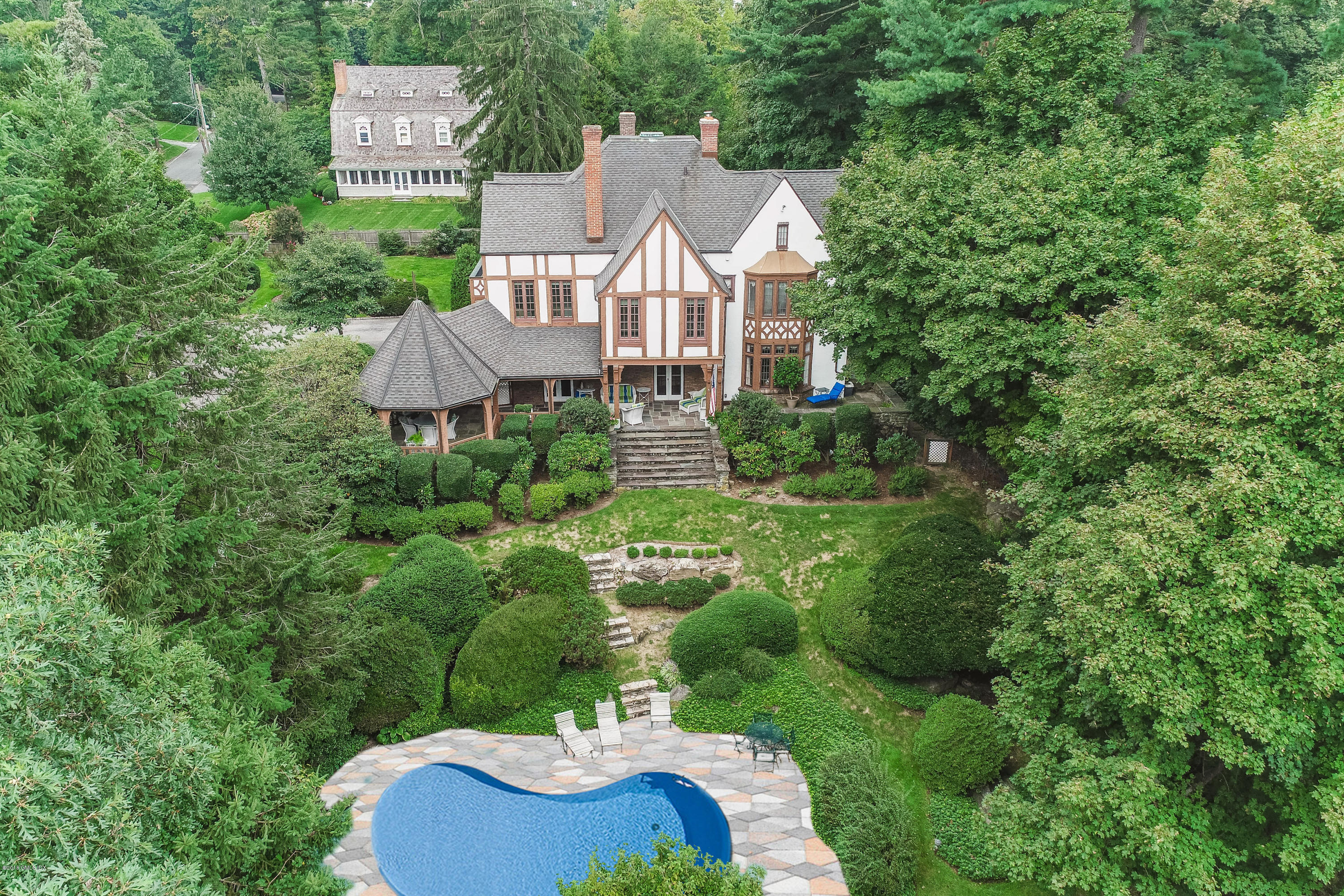 293 Shore Road Greenwich, CT 06830 - Photo 2 of 31 a aerial view of a house with yard and green space