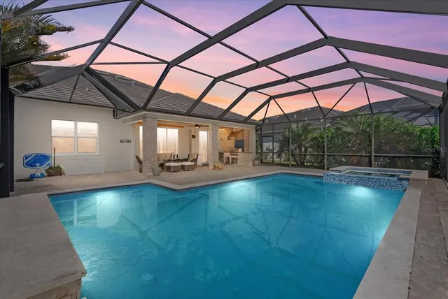 a front view of a house with a garden and plants