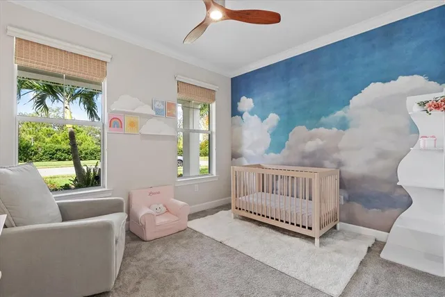 a bathroom with a sink vanity mirror and toilet