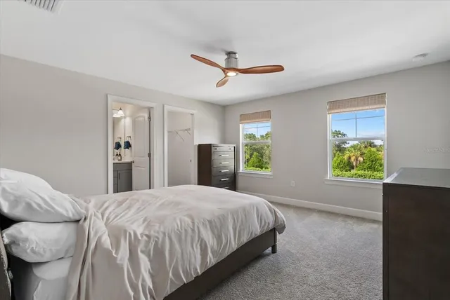 a view of a patio with a table and chairs