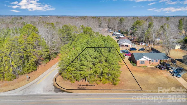 an aerial view of residential house with outdoor space