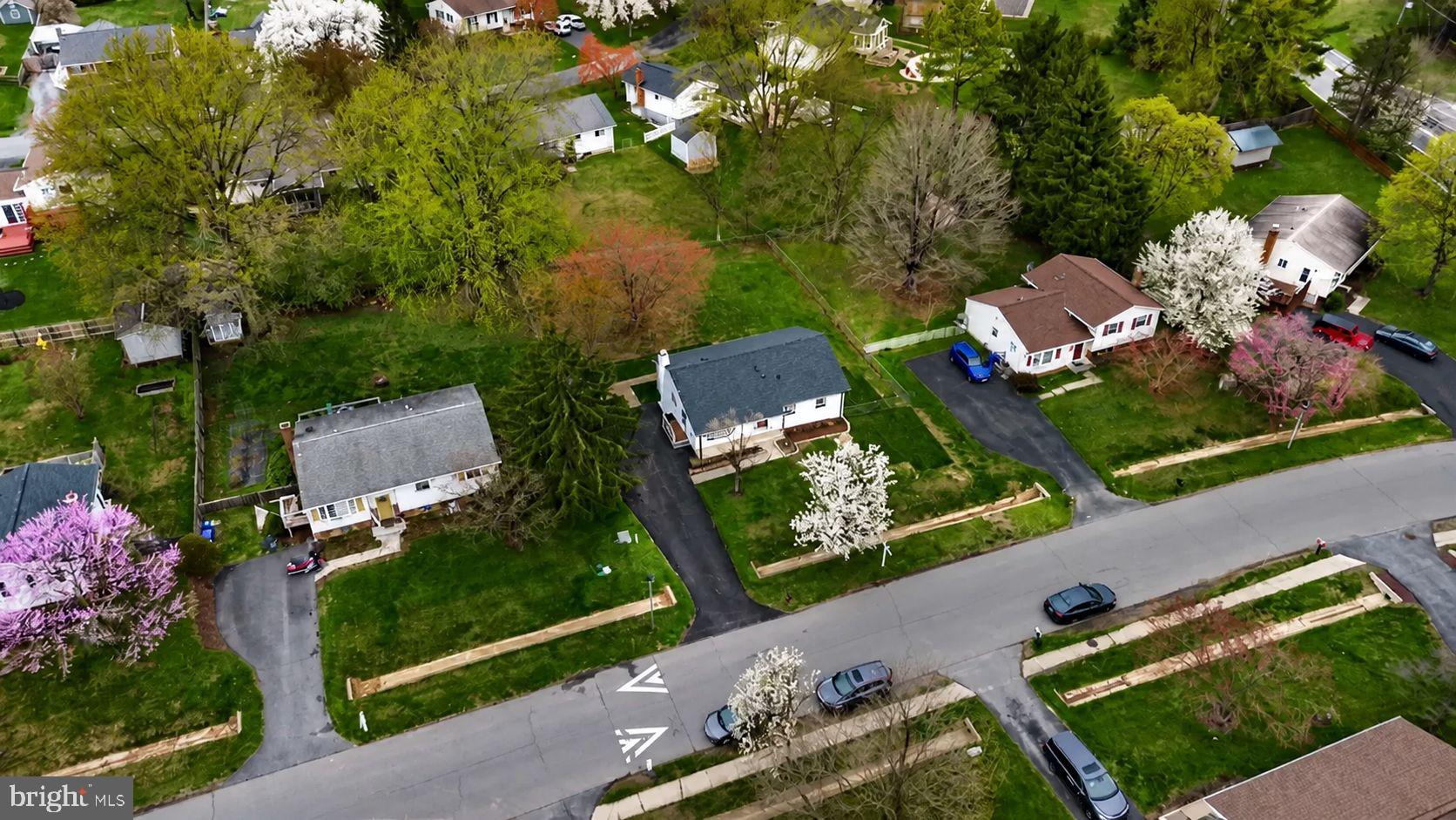 24320 Log House Road Gaithersburg, MD 20882 - Photo 43 of 43 an aerial view of a house with a garden