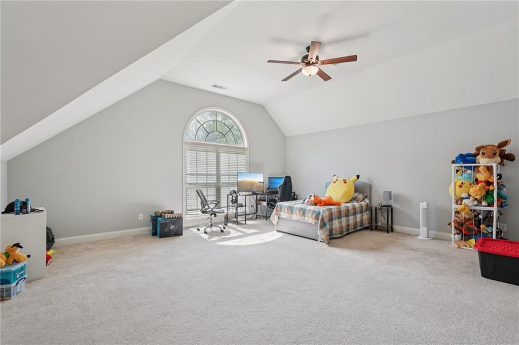 1330 Primrose Park Road Sugar Hill, GA 30518 - Photo 27 of 76 a view of dining room with furniture a chandelier and a window