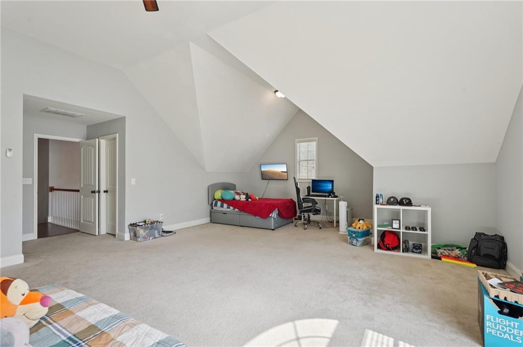1330 Primrose Park Road Sugar Hill, GA 30518 - Photo 28 of 76 a room with toys and white walls