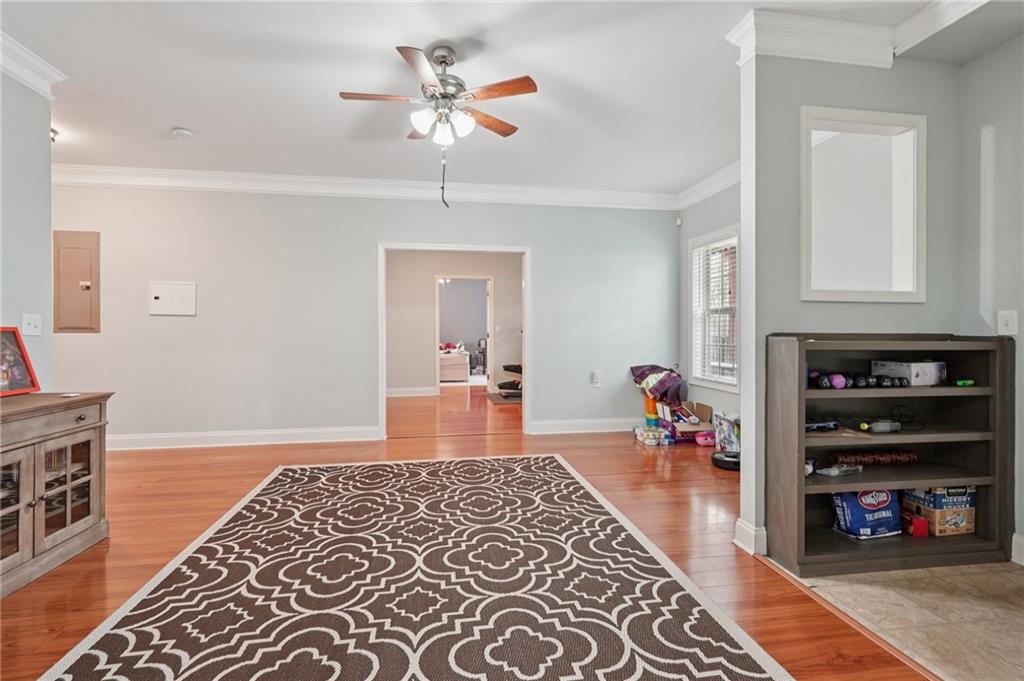 1330 Primrose Park Road Sugar Hill, GA 30518 - Photo 31 of 76 a living room with furniture and a fireplace