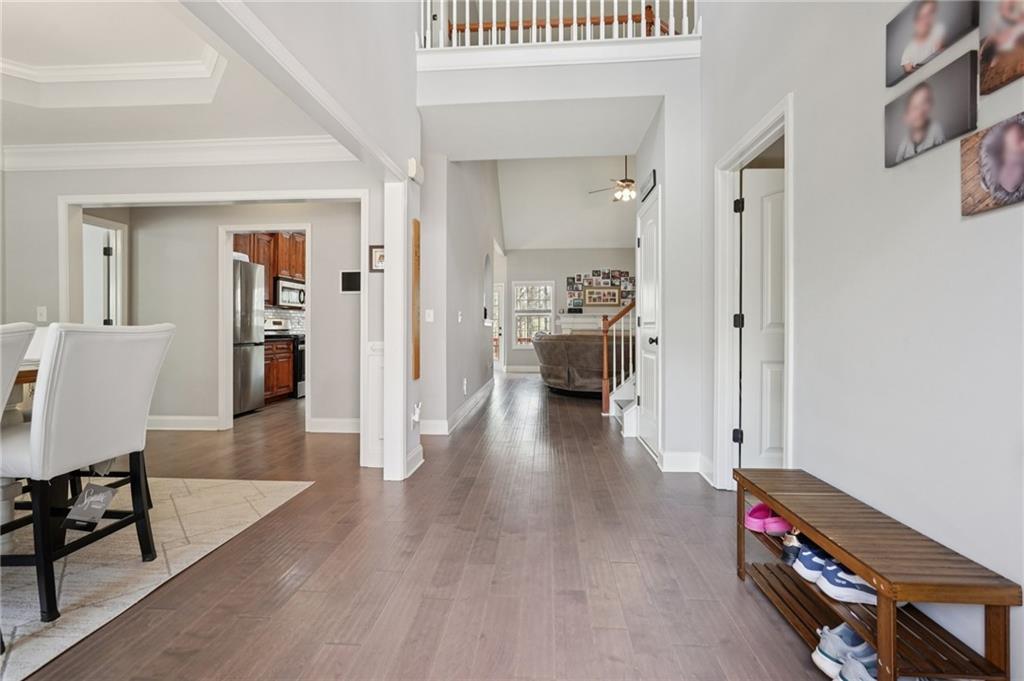 1330 Primrose Park Road Sugar Hill, GA 30518 - Photo 5 of 76 a view of livingroom with furniture and wooden floor