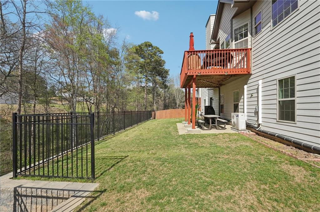 1330 Primrose Park Road Sugar Hill, GA 30518 - Photo 51 of 76 a view of a park with iron fence