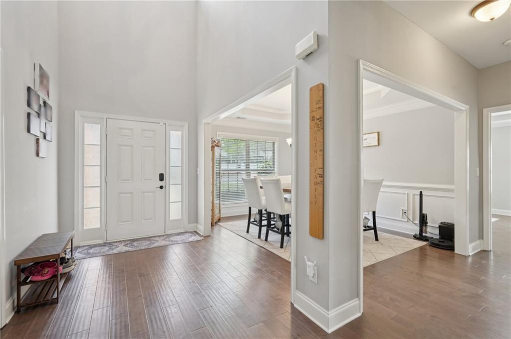 1330 Primrose Park Road Sugar Hill, GA 30518 - Photo 6 of 76 a view of a livingroom with furniture and hardwood floor