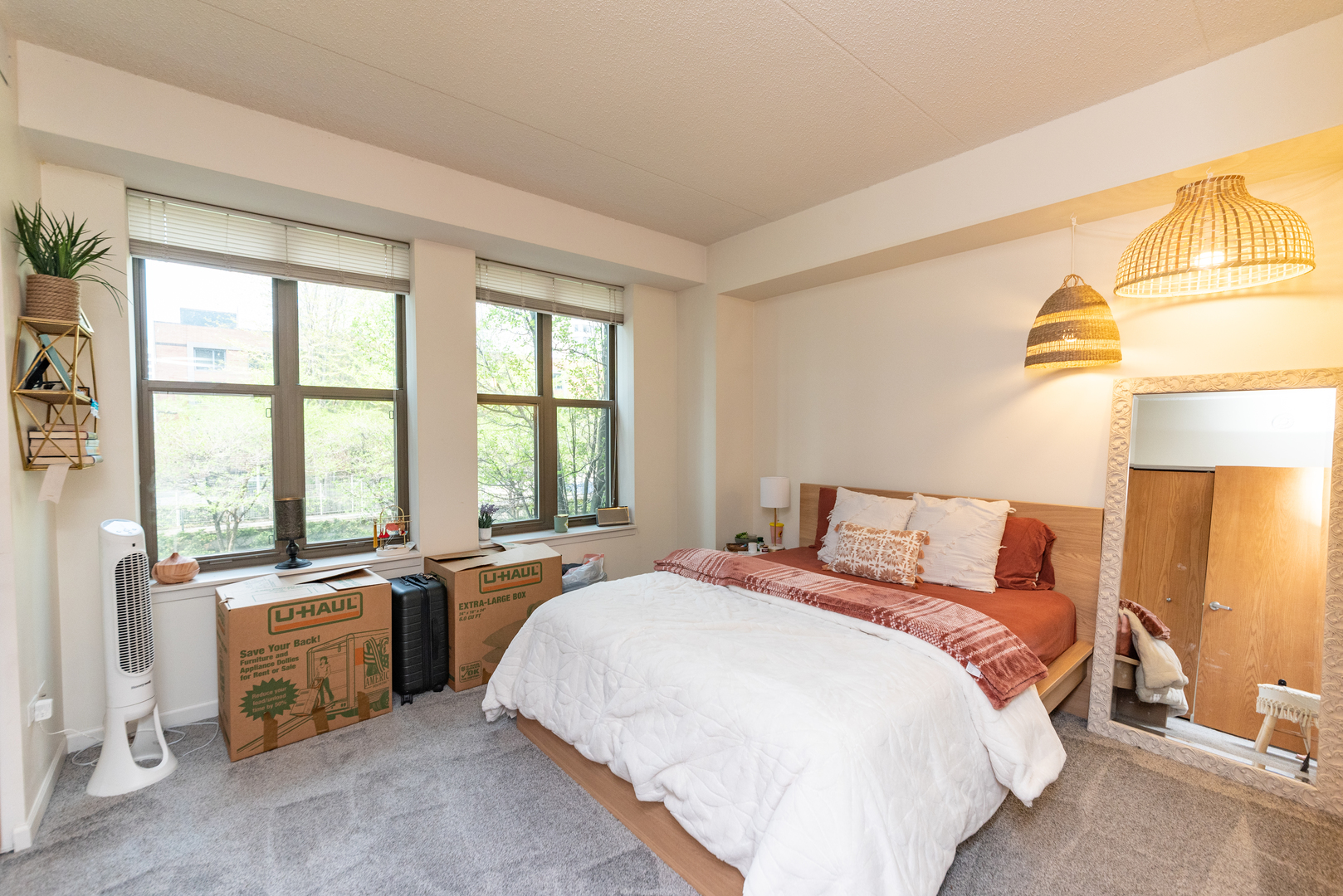 1250 South Indiana Avenue, Unit 812 Chicago, IL 60605 - Photo 6 of 23 a bed room with a bed and a chair