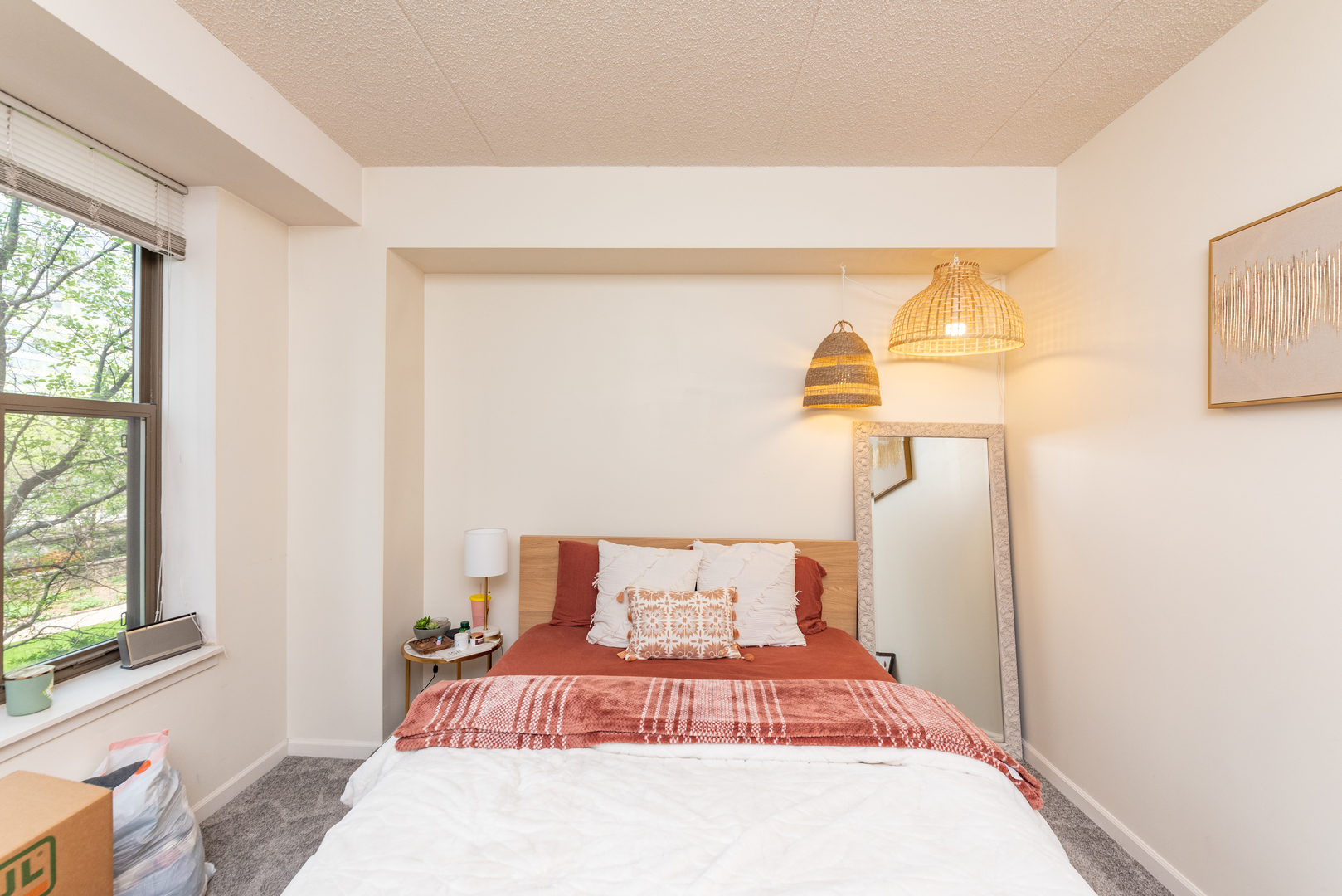 1250 South Indiana Avenue, Unit 812 Chicago, IL 60605 - Photo 7 of 23 a bedroom with a bed and a window