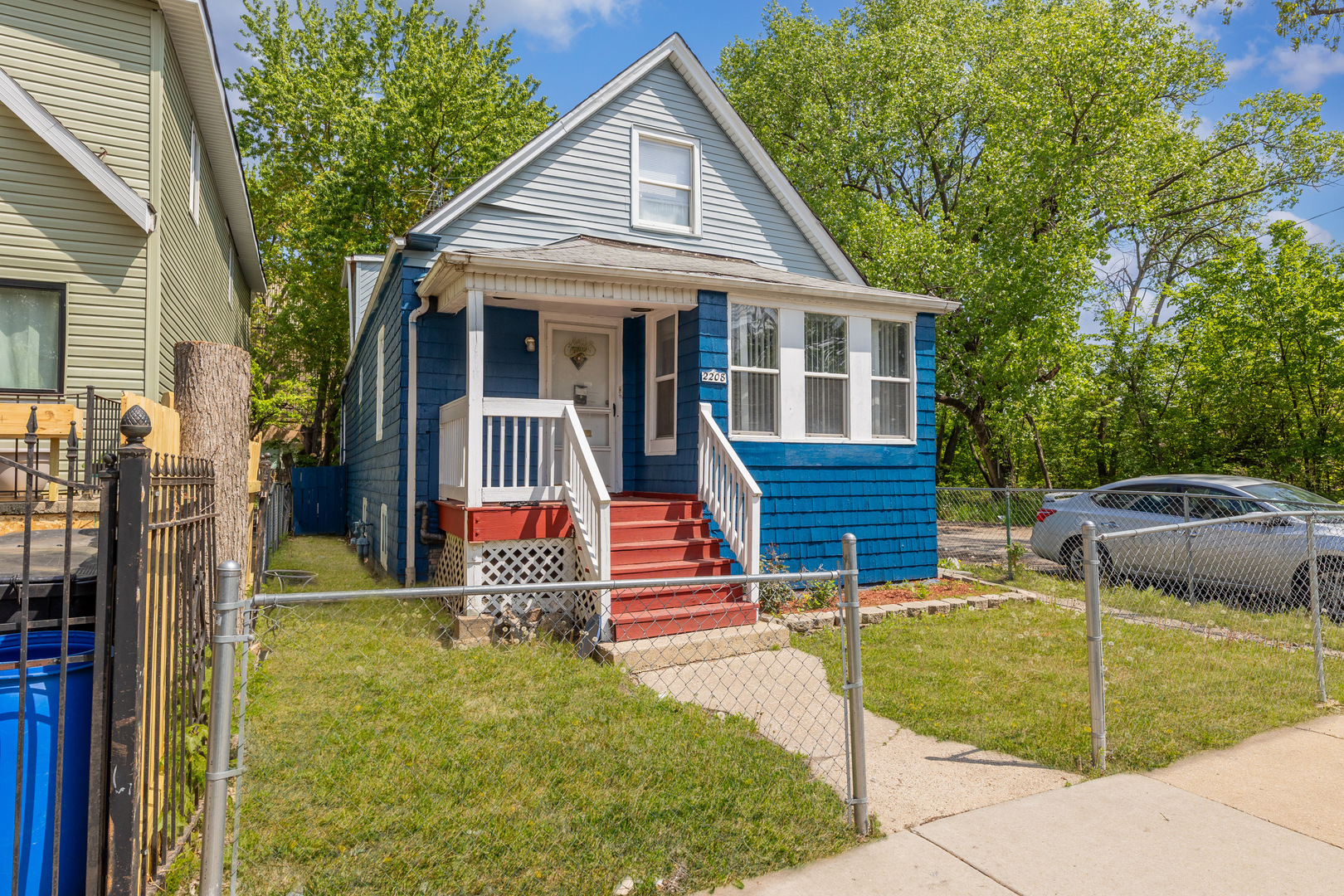 2208 West 54th Place Chicago, IL 60609 - Photo 2 of 18 a front view of a house with garden
