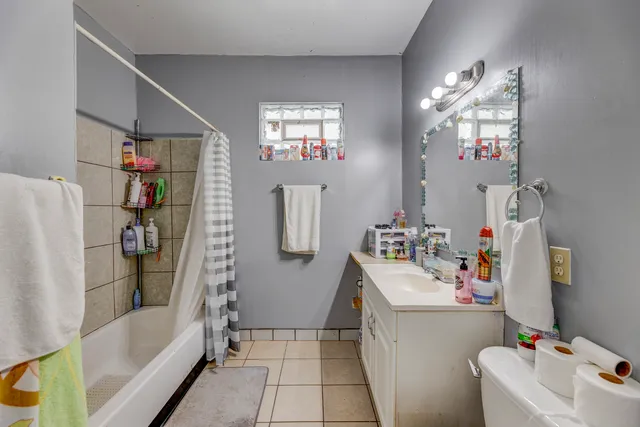 a bathroom with a sink and bathtub