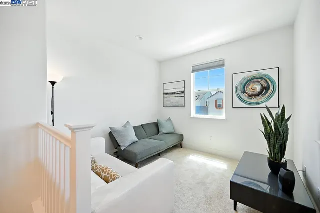 a bed room with a bed and a night stand