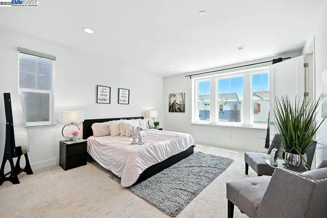 a bathroom with double vanity sink and a mirror