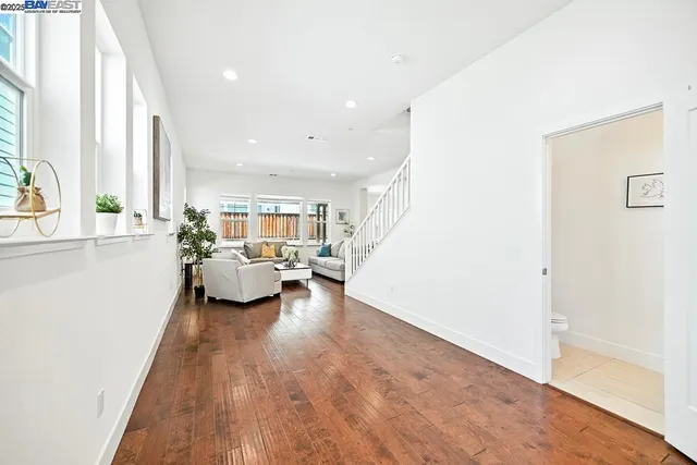 a living room with furniture or couch and a flat screen tv