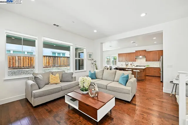 a kitchen with a table and chairs in it